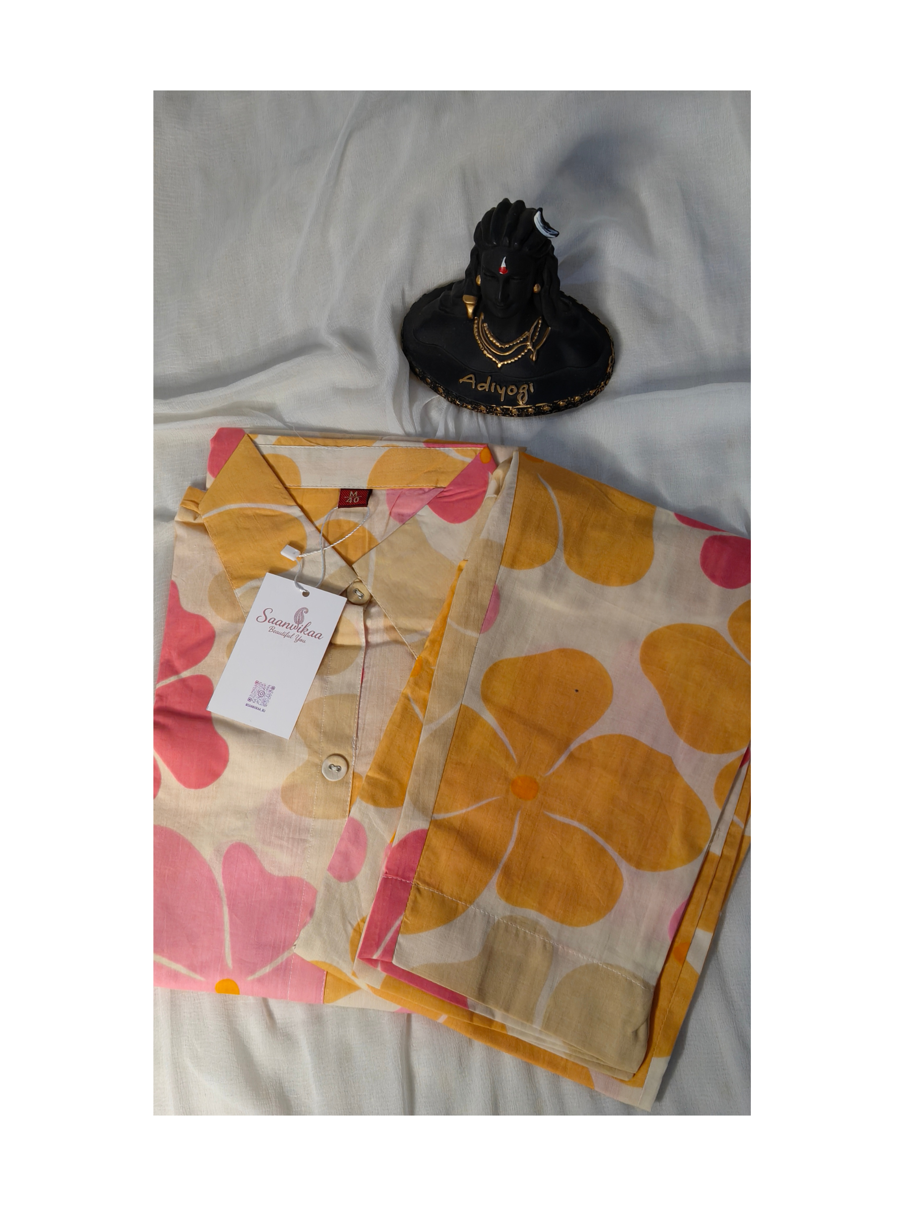 Floral print co-ord set with a soft beige base kurta and pant